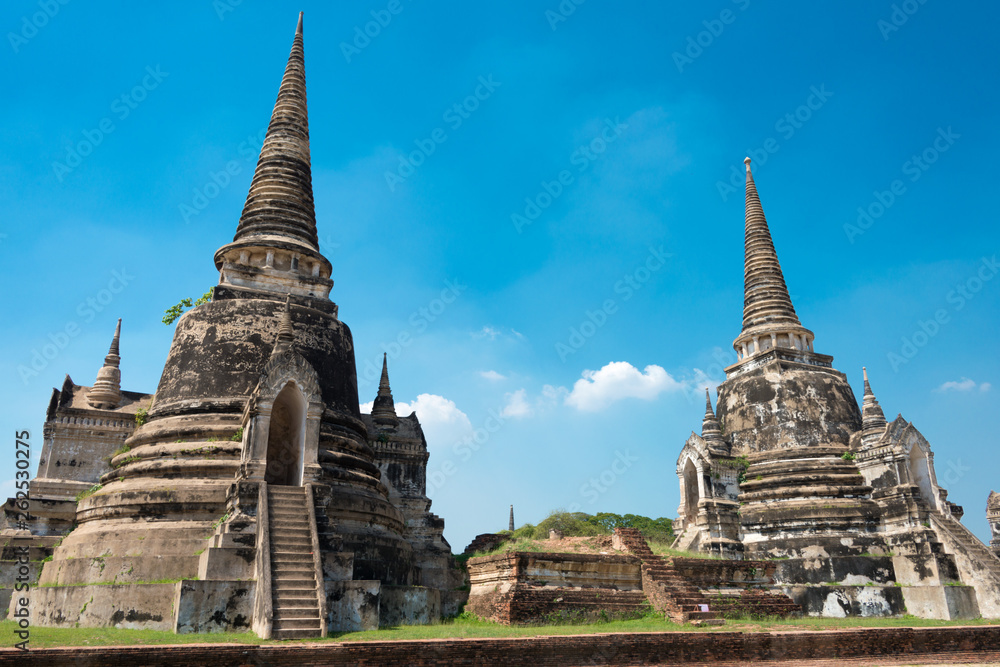 Fototapeta premium Ayutthaya, Thailand - Apr 10 2018: WAT PHRASISANPETH in Ayutthaya, Thailand. It is part of the World Heritage Site - Historic City of Ayutthaya.