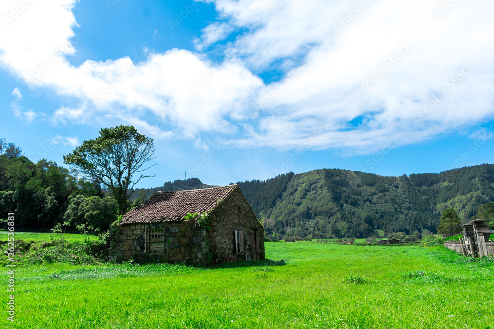 Abandoned farm house building in the middle of green forest, Sao Miguel, Azores, Portugal. Abandoned farm house building in the middle of green forest, Sao Miguel, Azores, Portugal.