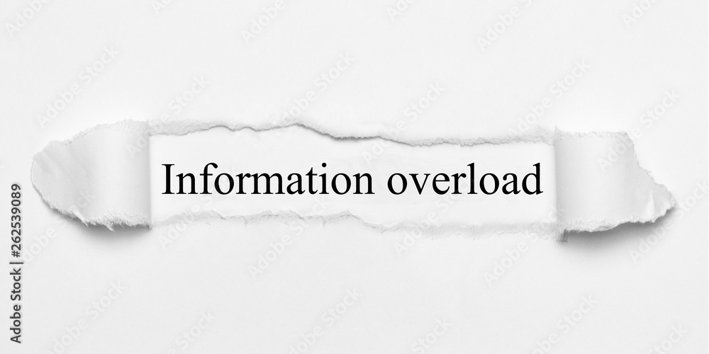 Obraz premium Information overload on white torn paper