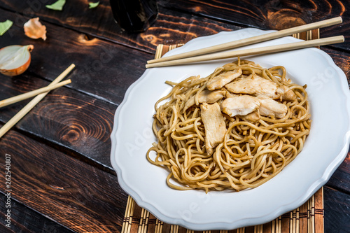 Asian noodles with chicken meat