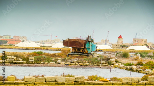 16407_An_old_machinery_on_the_dike_of_the_field_in_Italy.jpg