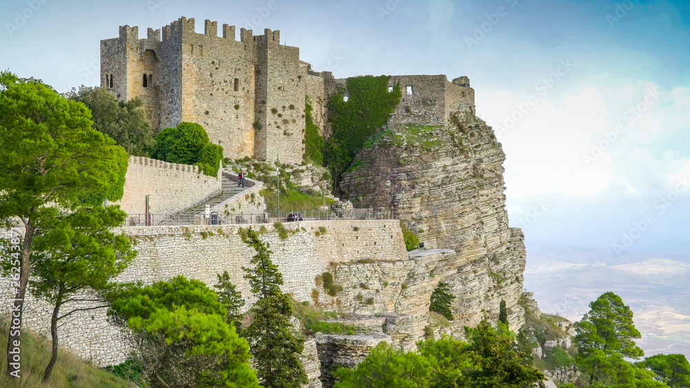 16486_The_castle_on_top_of_the_mountain_slope_in_Erice_Trapani_in_Italy.jpg