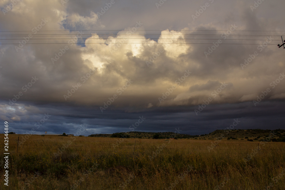 Before storm - heavy clouds above a plain