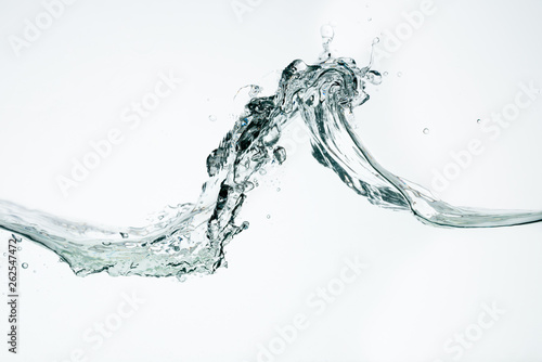 Wave of water against a white background
