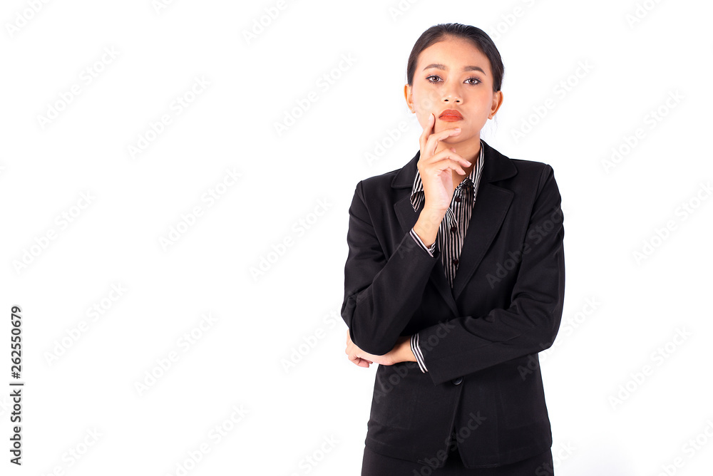 Portrait isolated Southeast Asian business woman wears dark gray suit is looking forward and place her hand on chin with white background Portrait isolated Southeast Asian business woman wears dark gray suit is looking forward and place her hand on chin with white background