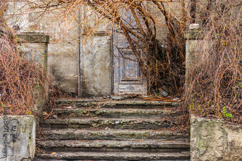 Fototapeta Naklejka Na Ścianę i Meble -  abandoned staircase (broken steps, bricks, cement and scratches). Background