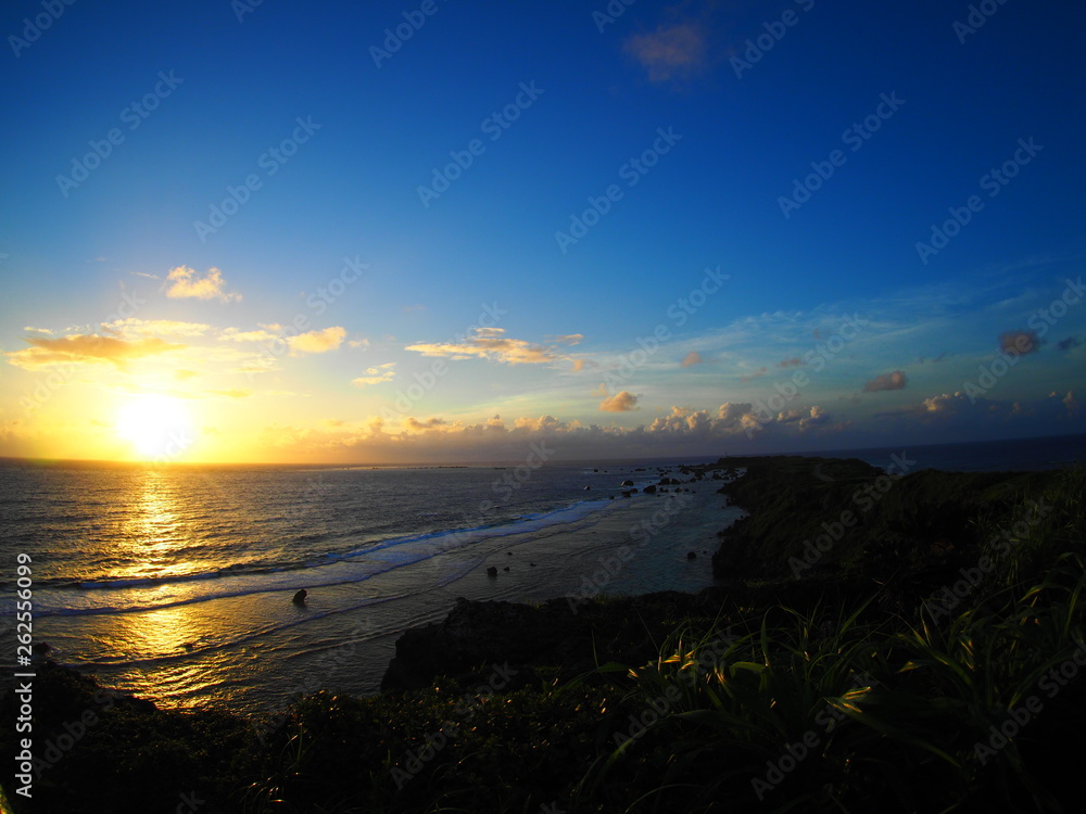 Fototapeta premium Sunset seen from the sea of Okinawa