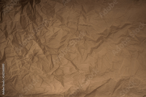 old crumpled plain wrapping paper texture background