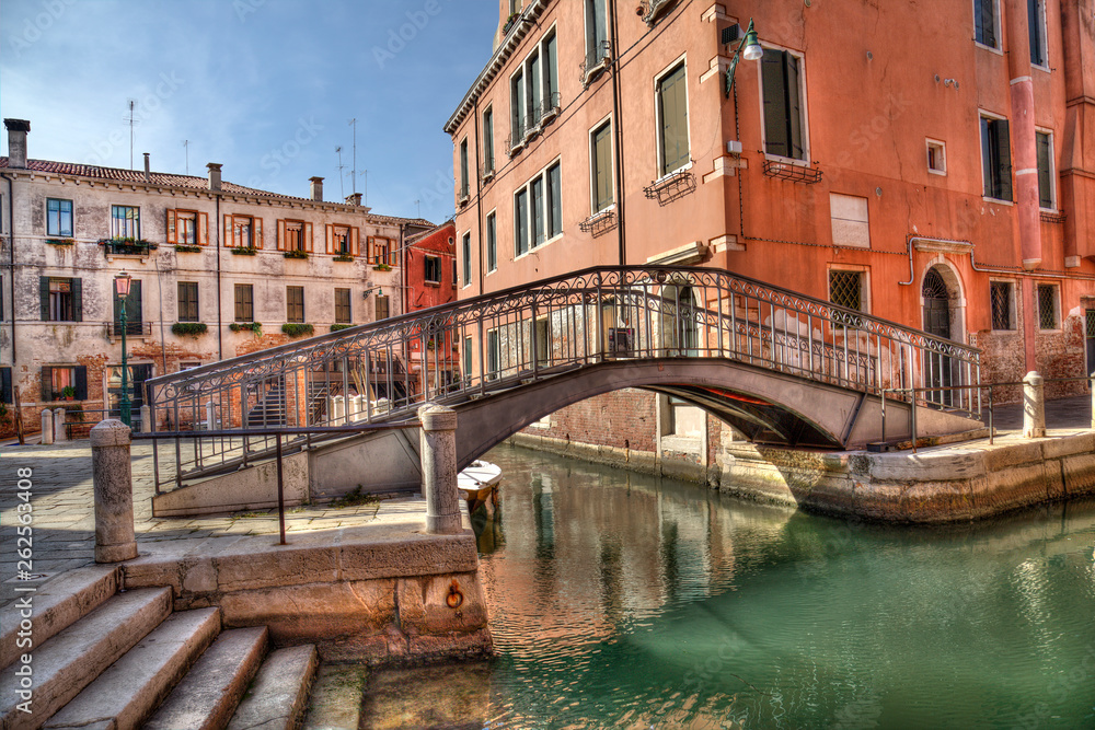 Small bridge and canal in Venice, Italy