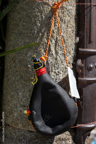 A wineskin is hanging 