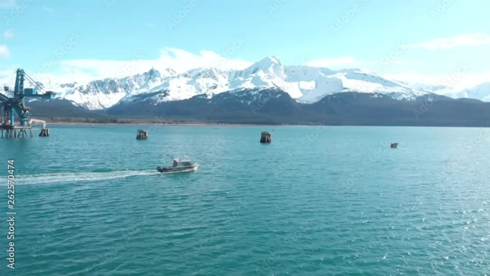 Small charter boats taking tourists out to see the wildlife and scenery of Alaska Small charter boats taking tourists out to see the wildlife and scenery of Alaska