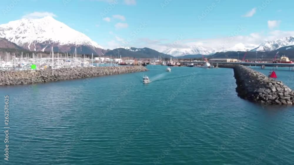 Small charter boats taking tourists out to see the wildlife and scenery of Alaska Small charter boats taking tourists out to see the wildlife and scenery of Alaska