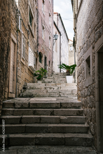 Fototapeta Naklejka Na Ścianę i Meble -  Alleyway in Korcula Old Town, Korcula Island in Dalmatian Coast of Croatia