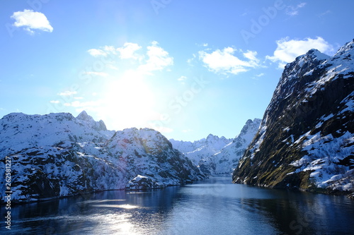 Trollfjord norway coast winter mountains sun blue sky