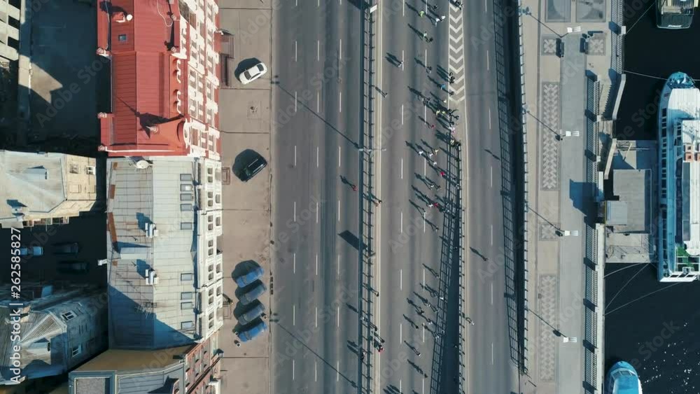 Marathon running on the street. Top view shot Marathon running on the street. Top view shot