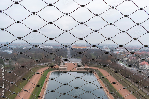 Принти на полотні Lake of Tears behind a net.