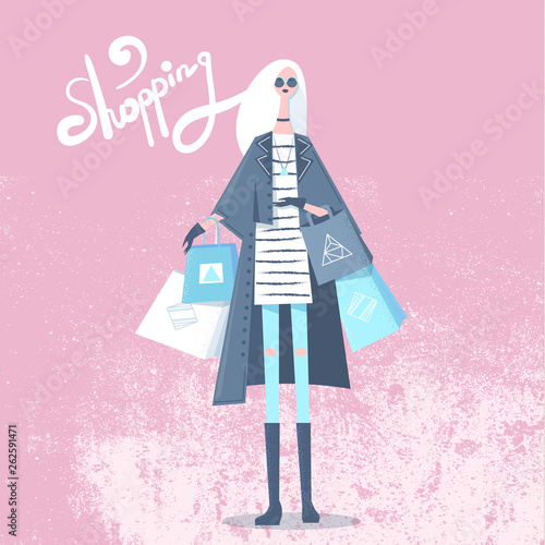 Fashionable woman, stylishly dressed with shopping