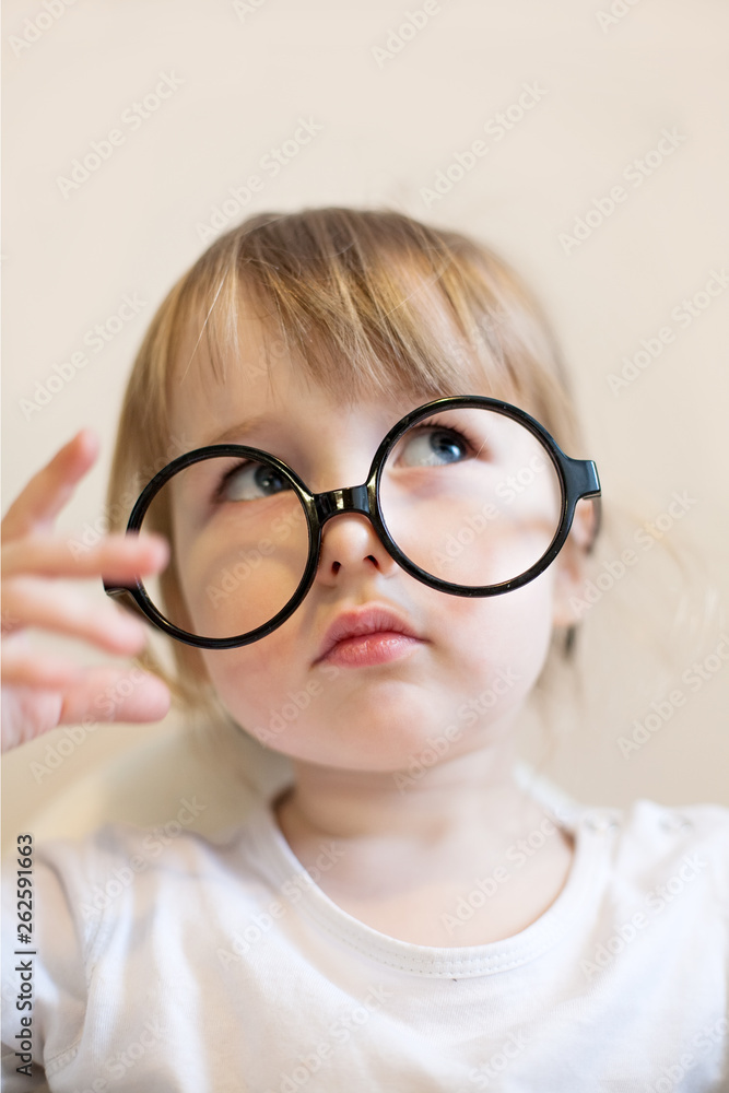 Baby with top big glasses