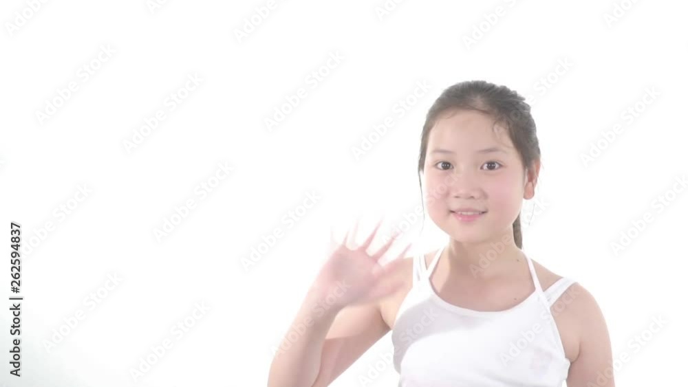 Zoom out slow motion of young Asian girl wave her hand as goodbye. Zoom out slow motion of young Asian girl wave her hand as goodbye.
