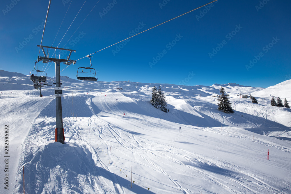 Beautiful winter landscape. People skiing in Hoch Ybrig ski resort, Switzerland, Europe.