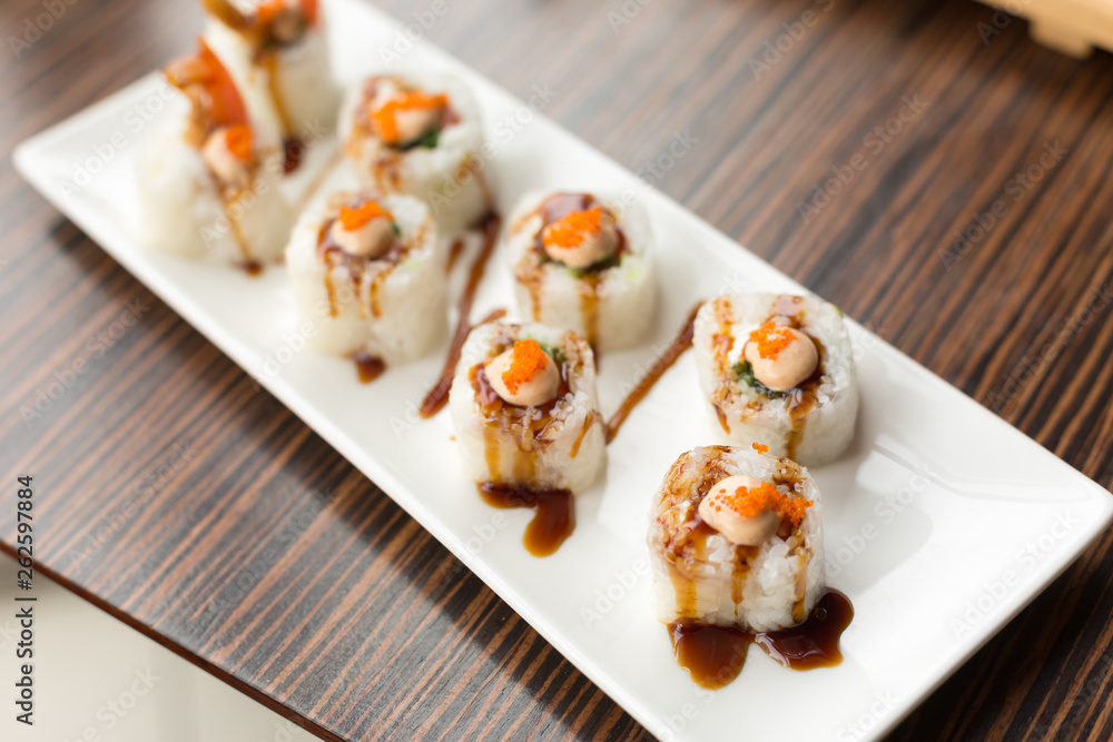 shrimp rolls. rolls on a white plate shrimp rolls. rolls on a white plate