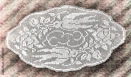 Handmade doily background texture grunge. Crocheted motive. Square tablecloth with flowers.