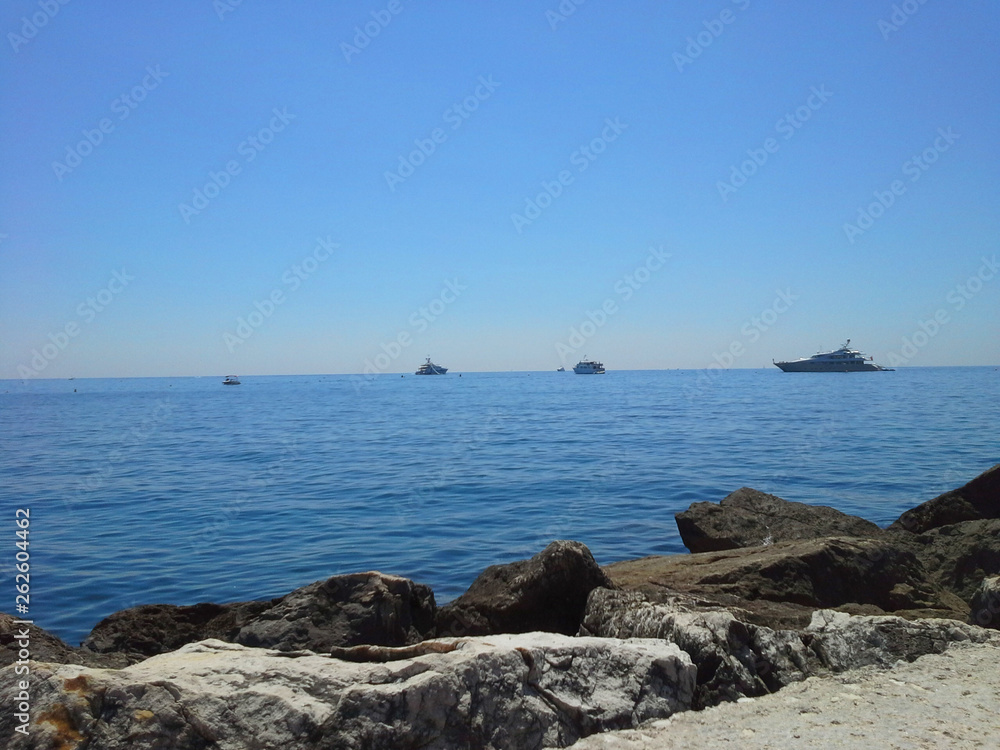 Luxury cruise yachting in Monte-carlo, Monaco. Seascape and concept of summer leisure. Luxury cruise yachting in Monte-carlo, Monaco. Seascape and concept of summer leisure.