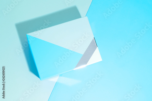 Layout of blue colored gift shoe boxe over blue background