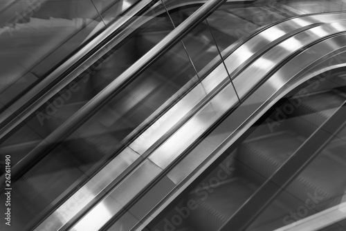 Steel escalator stairs in supermarket