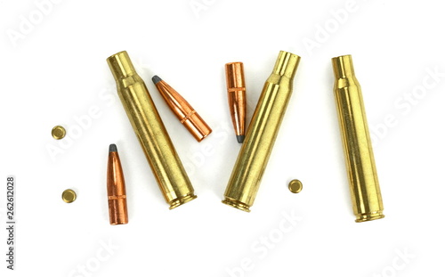Tableau sur toile A rifle bullet, empty shell on white background.