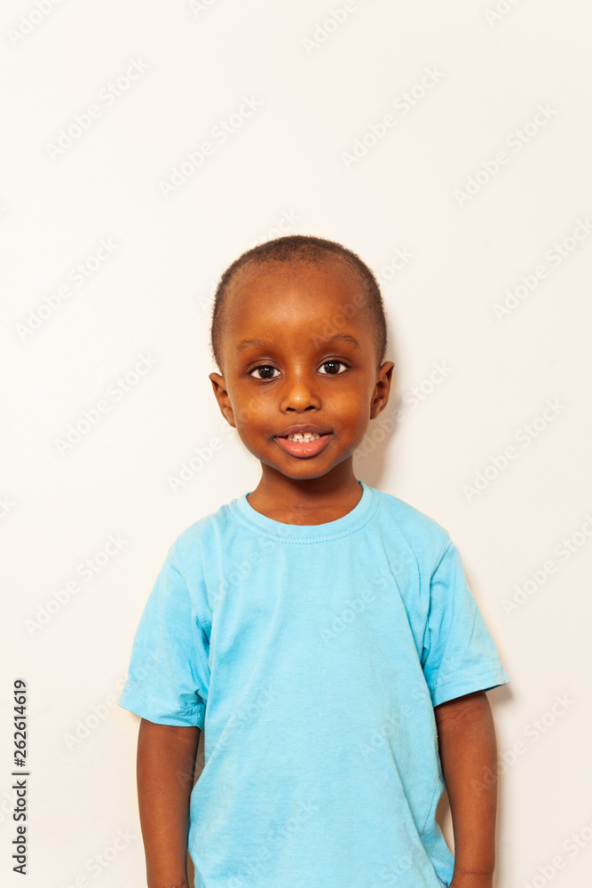 Close simple portrait of little black boy smiling