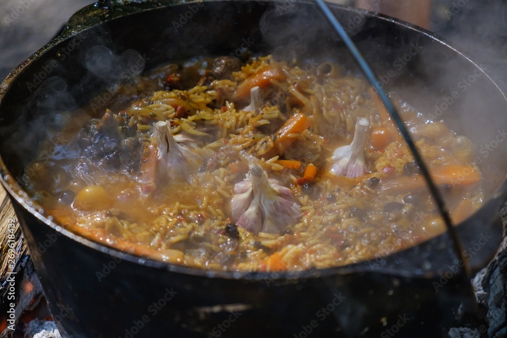 Pilaf cooking bowler bonfire boiler, carrots. Pilaf cooking bowler bonfire boiler, carrots.