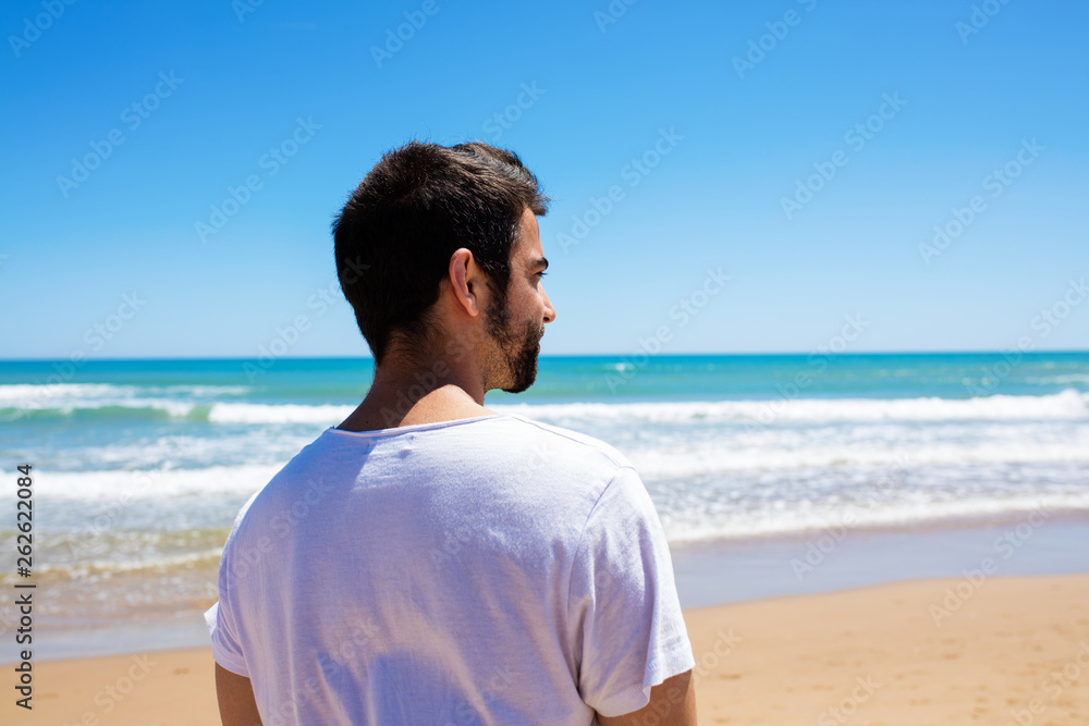 young man on the beach
