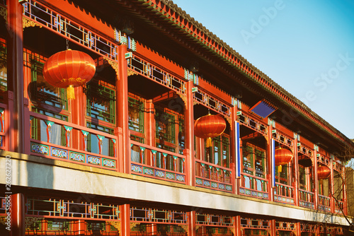Chinese house.Traditional Chinese ancient style building with wooden structure and red paint. © trialartinf