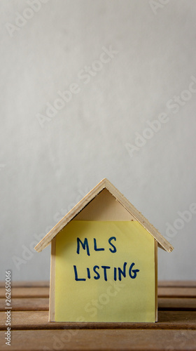 House or home model with text MLS (Multiple listing service) Listing (For Sale by Owner). Property or real estate concept.