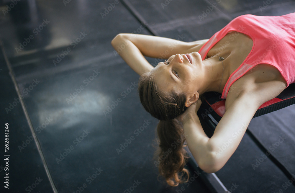 Sport woman lying down relax after the training session,Concept healthy and lifestyle,Female tired with taking a break after exercise and workout