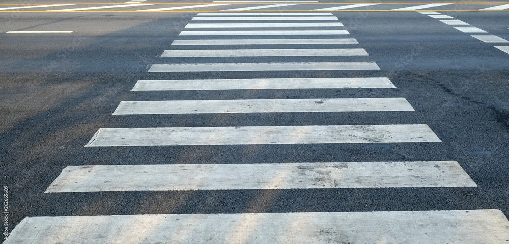 crosswalk on the road for safety when people walking cross the street crosswalk on the road for safety when people walking cross the street