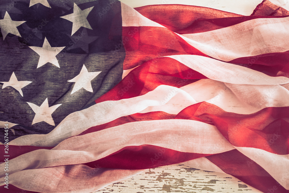 Patriotic symbolism. American flag on wooden background Patriotic symbolism. American flag on wooden background