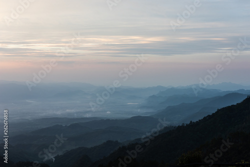 Beautiful mountain and morning sunrise over the sea of mist. Mon Sone View point , Doi Pha Hom Pok National Park in Chiang Mai,Thailand.