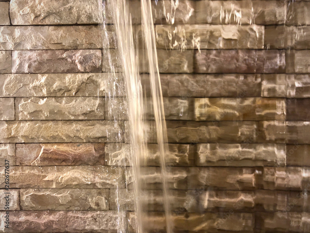 beautiful waterfall background on rock tile wall decorated by rock tiles beige color separate to two layer, brown background separate to two part, interior design by water and tile background texture beautiful waterfall background on rock tile wall decorated by rock tiles beige color separate to two layer, brown background separate to two part, interior design by water and tile background texture
