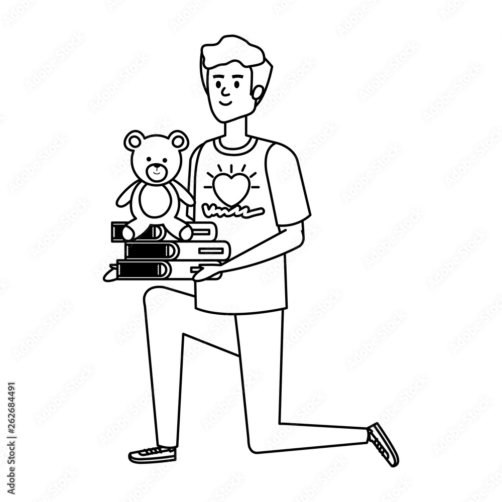 man volunteer with books and bear teddy man volunteer with books and bear teddy