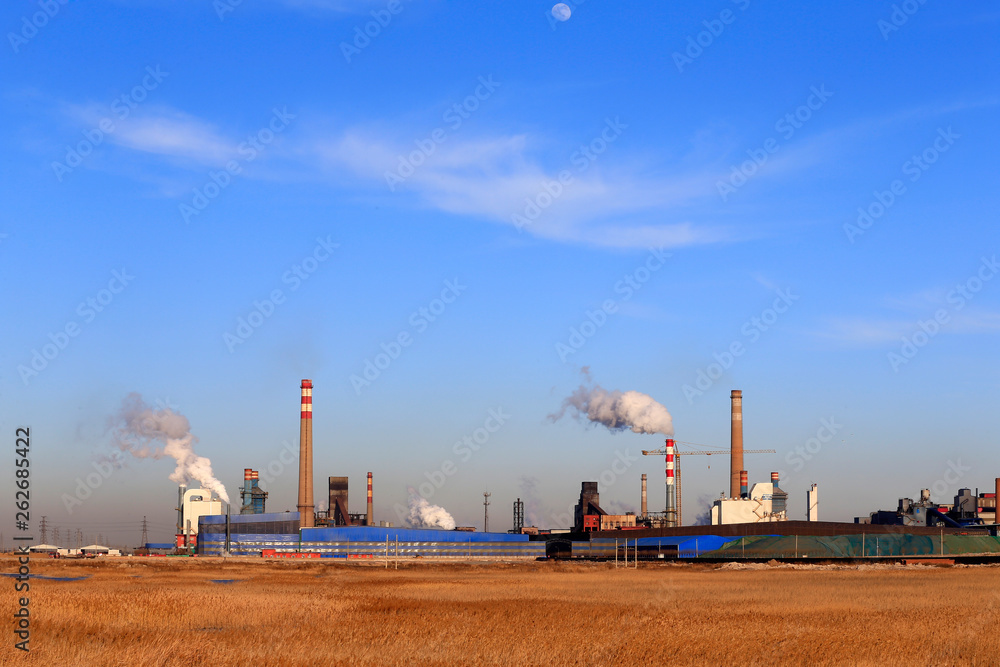 A chemical plant against a blue sky A chemical plant against a blue sky
