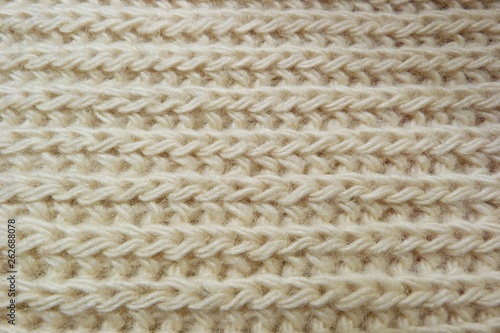 beige knit fabric closeup background