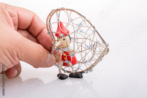 Pinocchio doll sitting in a...