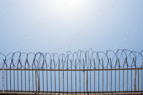 barbed fence  for protection purposes photo