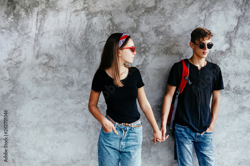 Teenage friends in same clothes