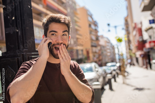 young man talking on mobile phone