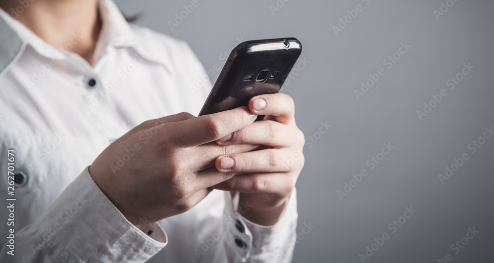 Fototapeta premium Business girl using smartphone. Technology
