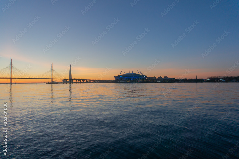 Saint-Petersburg, Russia. Wiews to gulf illuminated by multi-colored lights at night.