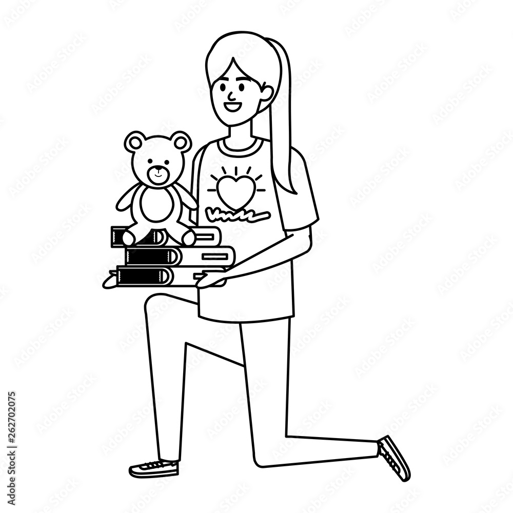 woman volunteer with books and bear teddy woman volunteer with books and bear teddy